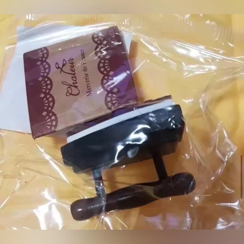 $1 FRENCH MERCI STAMP. IRON SHAPED. NEW $1 WITH ANY $10 ORDER OR MORE